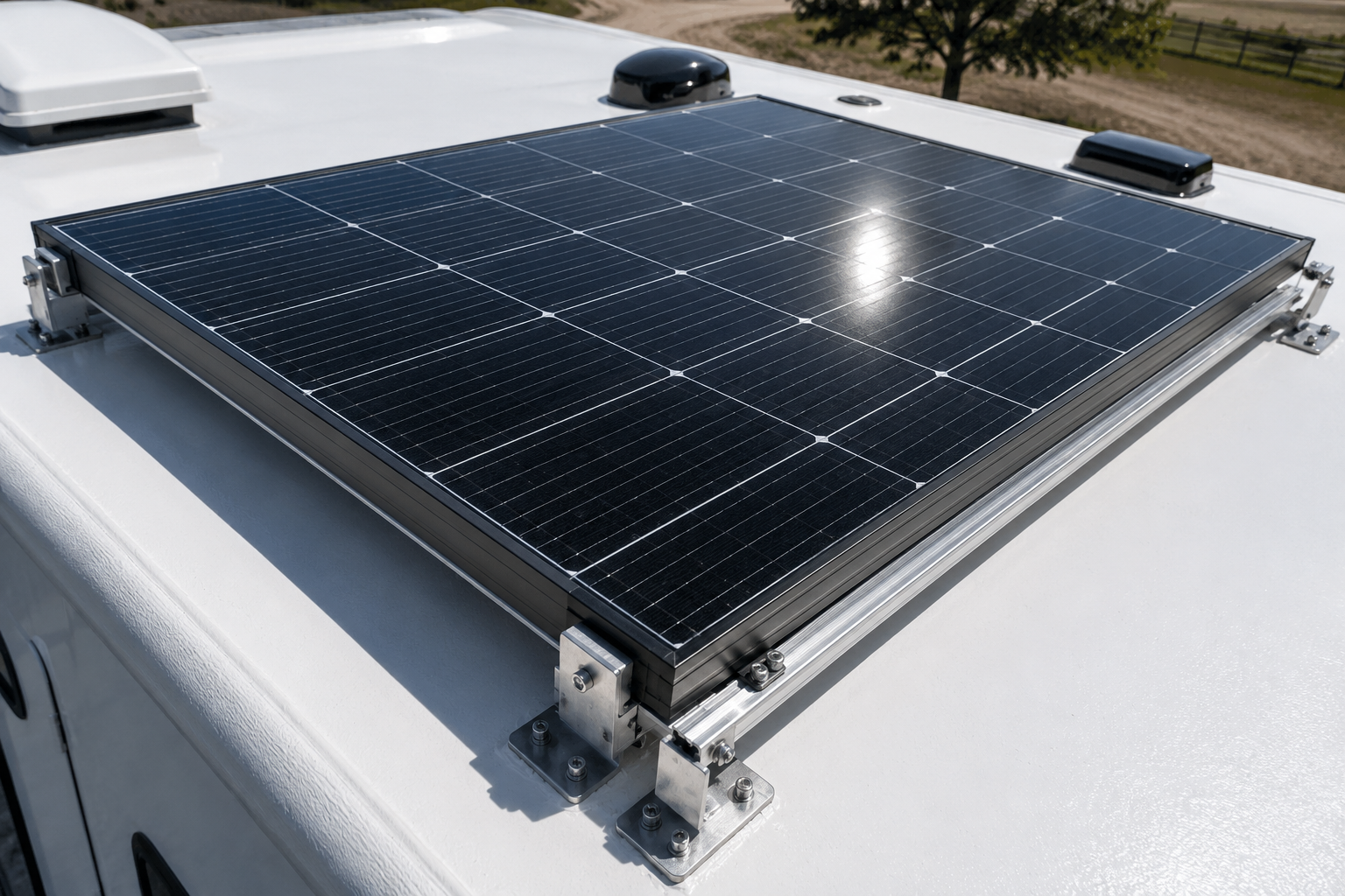 Rigid monocrystalline solar panel on RV roof